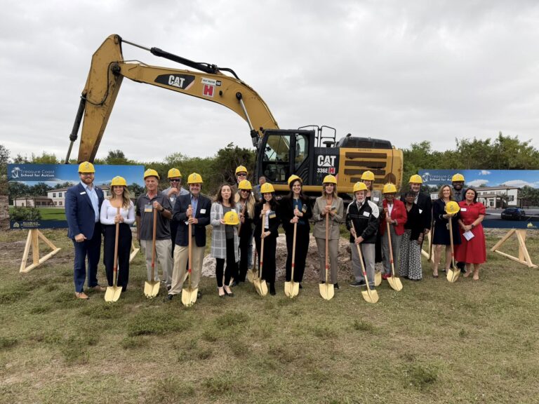 Groundbreaking ceremony for the future Treasure Coast School for Autism campus, attendees wearing hard hats